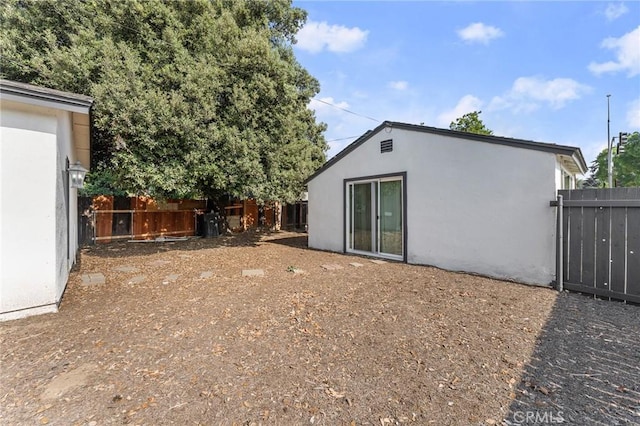 2998 N H St, San Bernardino, CA 92405 - rear view of property with stucco siding