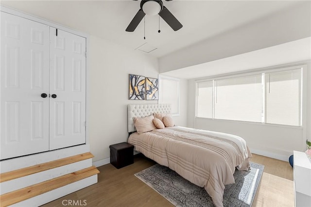 2998 N H St, San Bernardino, CA 92405 - bedroom with wood finished floors, ceiling fan, and a closet