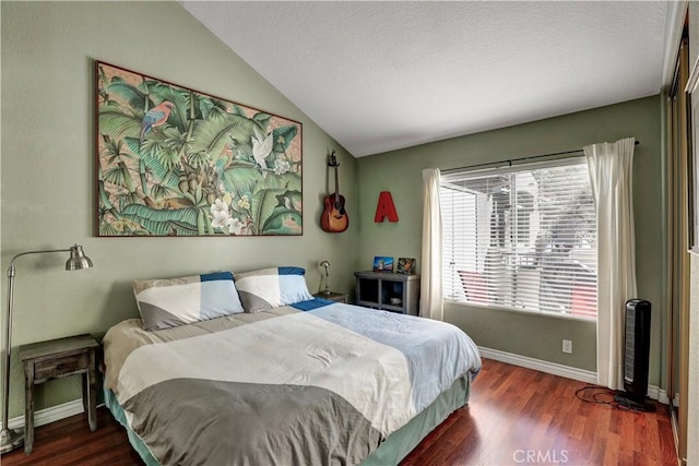 94 Cinnamon Teal, Aliso Viejo, CA 92656 - bedroom featuring wood finished floors, lofted ceiling, and a textured ceiling