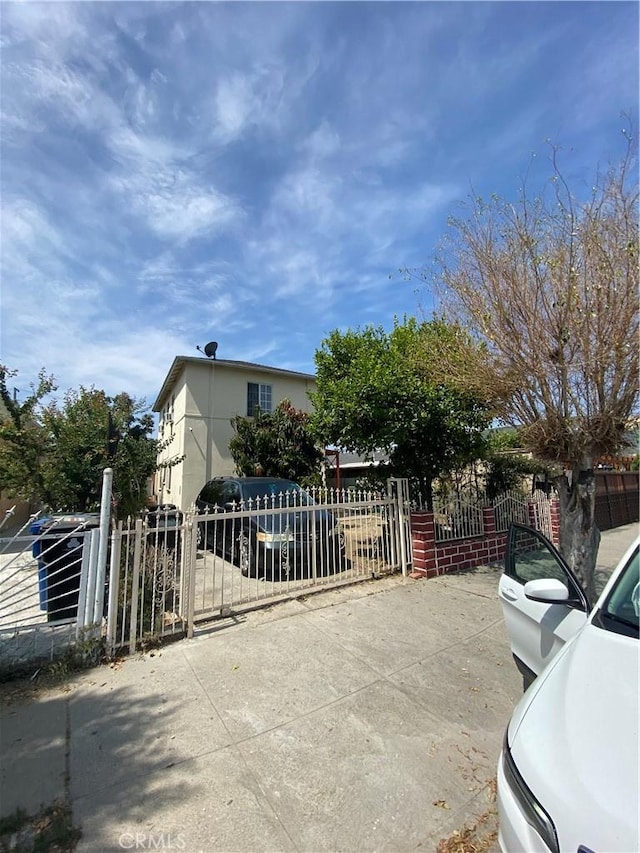 1348 E 21st St, Los Angeles, CA 90011 - exterior space featuring a gate and a fenced front yard