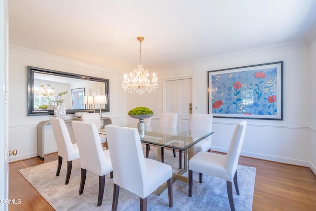 653 Chaucer Rd, San Marino, CA 91108 - dining room featuring a chandelier, wood finished floors, and ornamental molding