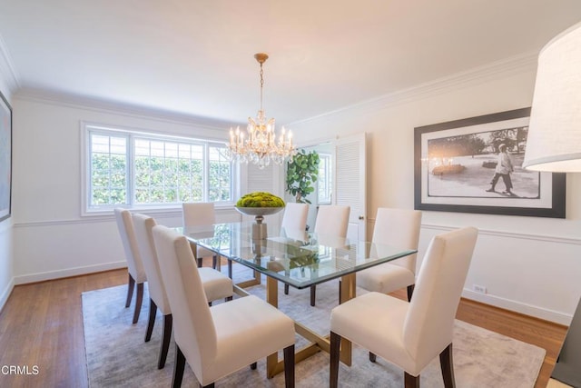 653 Chaucer Rd, San Marino, CA 91108 - dining space featuring ornamental molding, a chandelier, and wood finished floors