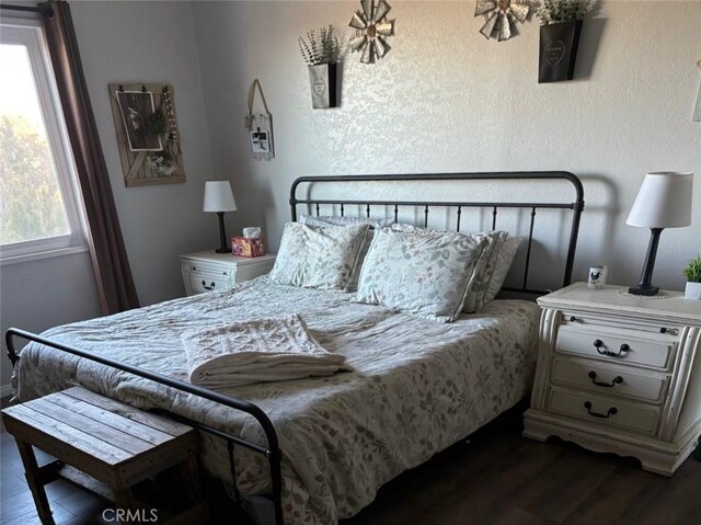 2033 Hollister Rd, Pinon Hills, CA 92372 - bedroom with dark wood finished floors