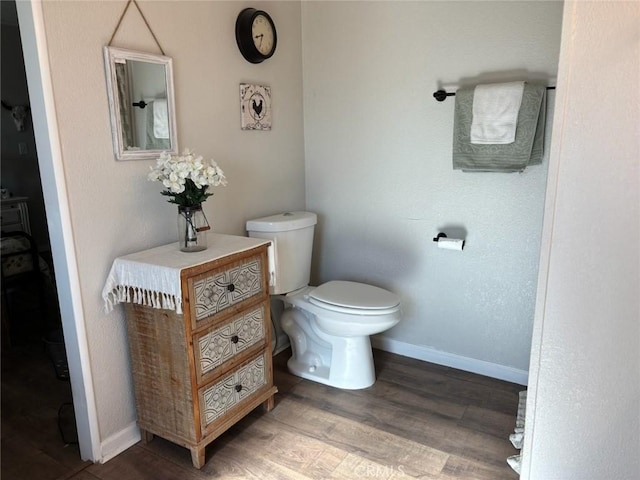 2033 Hollister Rd, Pinon Hills, CA 92372 - bathroom with toilet and wood finished floors
