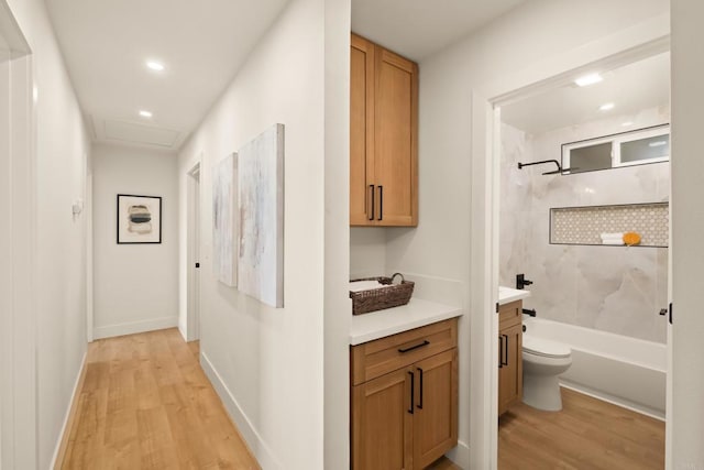 101 Coolwater Dr, San Diego, CA 92114 - corridor featuring light wood-type flooring, recessed lighting, and attic access