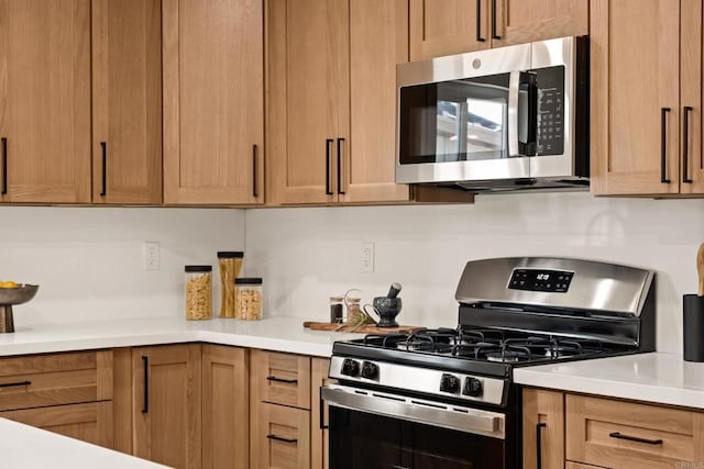 101 Coolwater Dr, San Diego, CA 92114 - kitchen featuring appliances with stainless steel finishes and light countertops