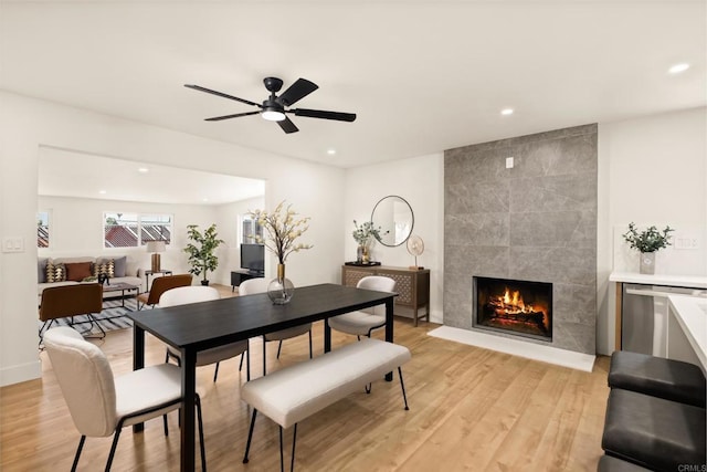 101 Coolwater Dr, San Diego, CA 92114 - dining room featuring light wood finished floors, recessed lighting, a fireplace, and ceiling fan