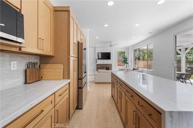2517 Renata Ct, Thousand Oaks, CA 91362 - kitchen featuring black microwave, recessed lighting, light wood-type flooring, stainless steel fridge with ice dispenser, and ceiling fan