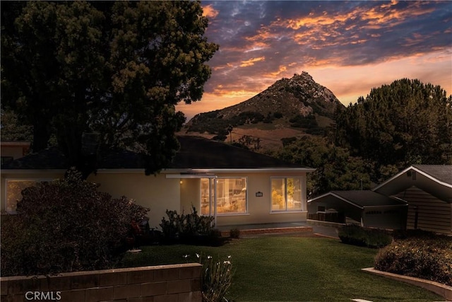 53 Rafael Way, San Luis Obispo, CA 93405 - view of front of house featuring a yard, stucco siding, and a mountain view