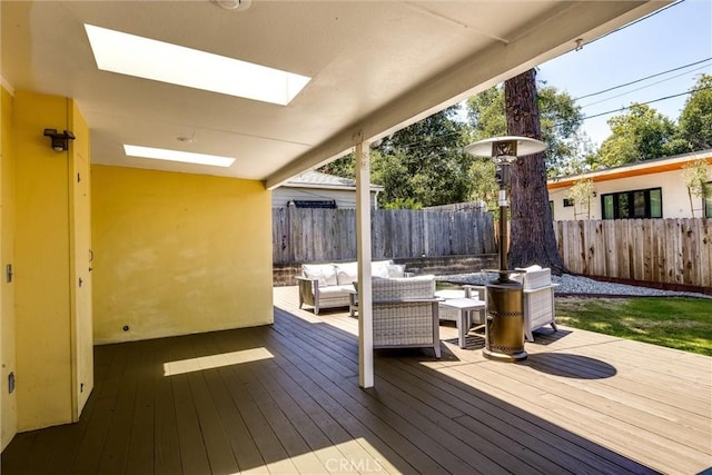 53 Rafael Way, San Luis Obispo, CA 93405 - wooden deck with outdoor lounge area and a fenced backyard