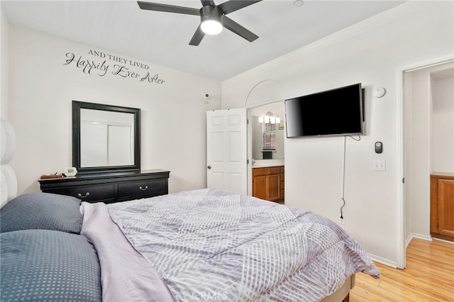 3381 Evening Mist Ln, Perris, CA 92571 - bedroom with light wood-type flooring, vaulted ceiling, a ceiling fan, and ensuite bath