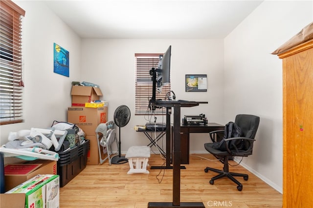 3381 Evening Mist Ln, Perris, CA 92571 - office area with light wood-style floors and baseboards