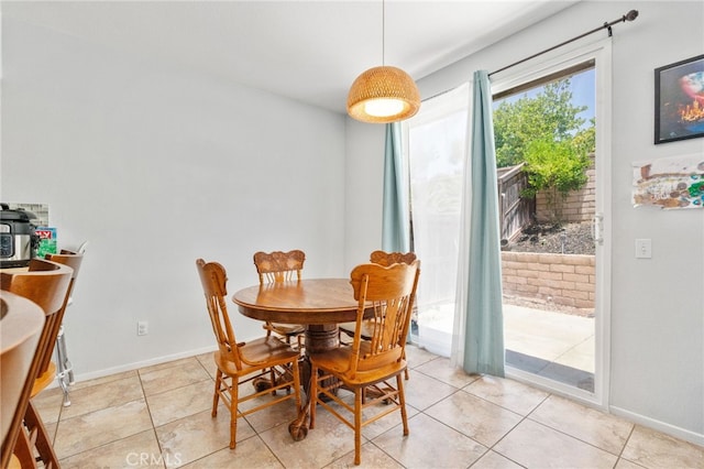 3381 Evening Mist Ln, Perris, CA 92571 - dining space with light tile patterned floors and baseboards