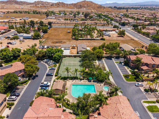 3381 Evening Mist Ln, Perris, CA 92571 - aerial perspective of suburban area with a mountainous background and a pool