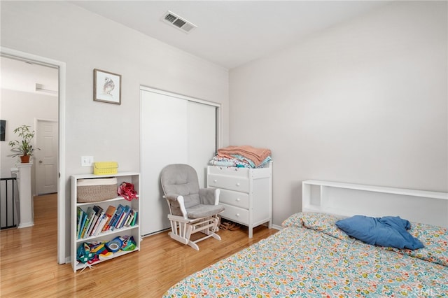 3381 Evening Mist Ln, Perris, CA 92571 - bedroom featuring wood finished floors and a closet