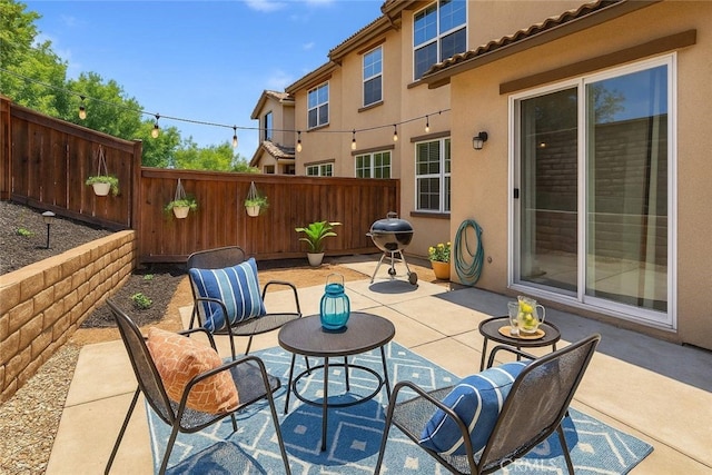 3381 Evening Mist Ln, Perris, CA 92571 - fenced backyard featuring a patio and a grill
