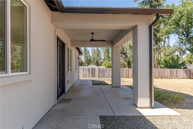 5790 Fickett Ln, Paradise, CA 95969 - fenced backyard with ceiling fan and a patio