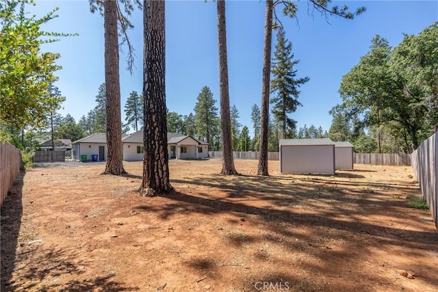 5790 Fickett Ln, Paradise, CA 95969 - fenced backyard with a storage unit