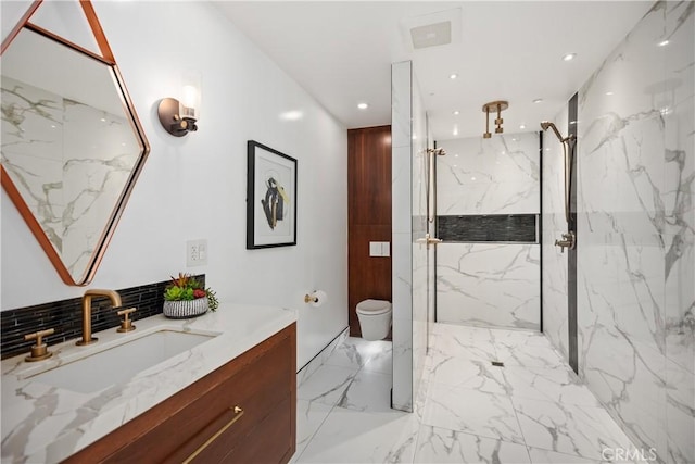 496 E 16th, Costa Mesa, CA 92627 - bathroom with marble tiled flooring, vanity, a marble finish shower, and recessed lighting