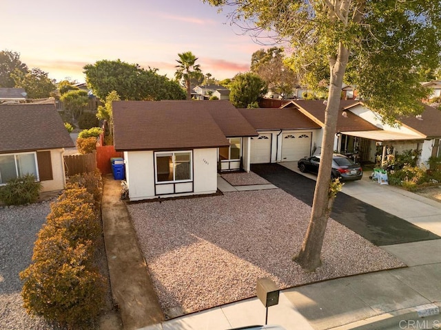 1405 Highridge Dr, Oceanside, CA 92056 - view of front of house with driveway, a garage, roof with shingles, and stucco siding