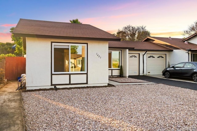 1405 Highridge Dr, Oceanside, CA 92056 - ranch-style home with a garage, stucco siding, and asphalt driveway