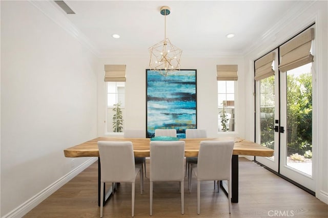 33 Renata, Newport Coast, CA 92657 - dining room featuring a chandelier, light wood-type flooring, ornamental molding, and recessed lighting