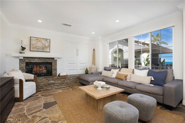 33 Renata, Newport Coast, CA 92657 - living room with a fireplace, crown molding, stone finish floors, and recessed lighting