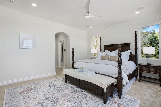33 Renata, Newport Coast, CA 92657 - bedroom featuring light carpet, multiple windows, arched walkways, crown molding, and recessed lighting