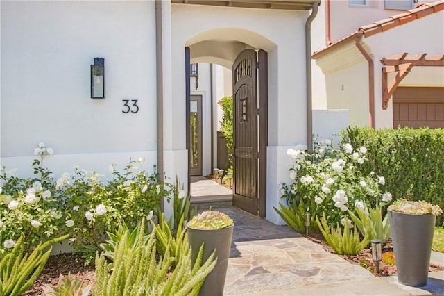 33 Renata, Newport Coast, CA 92657 - doorway to property with stucco siding