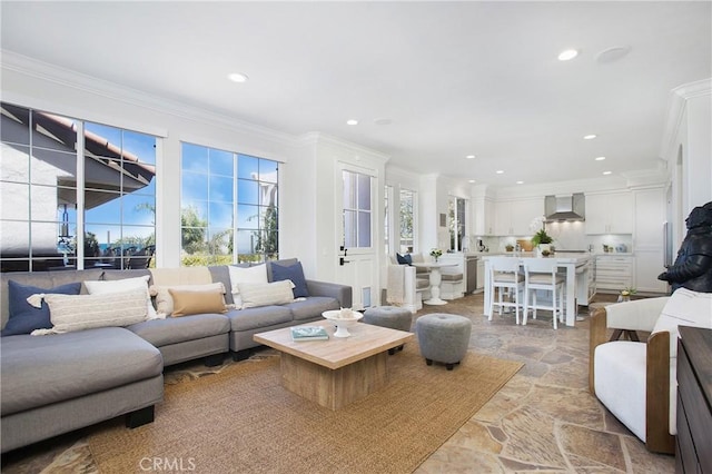 33 Renata, Newport Coast, CA 92657 - living room with ornamental molding, stone finish floors, and recessed lighting