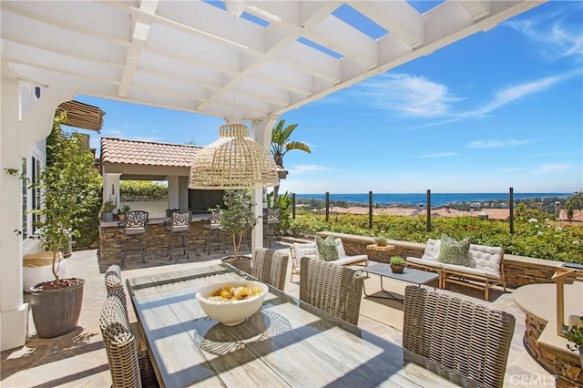 33 Renata, Newport Coast, CA 92657 - view of patio with outdoor lounge area and a water view