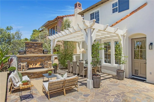33 Renata, Newport Coast, CA 92657 - view of patio with an outdoor living space with a fireplace and a pergola