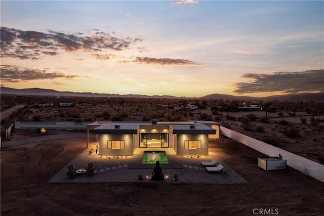 60632 Granville Rd, Joshua Tree, CA 92252 - rear view of house featuring a mountain view and stucco siding