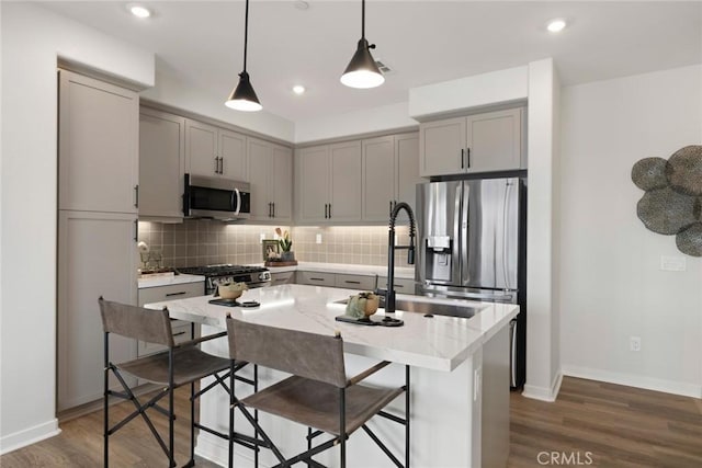 2601 Durfee Ave Unit F, El Monte, CA 91732 - kitchen with appliances with stainless steel finishes, gray cabinets, backsplash, dark wood-style floors, and recessed lighting