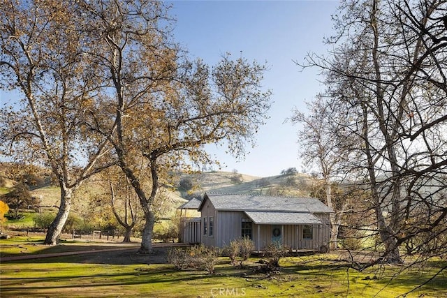 19623 Rd 211, Friant, CA 93626 - view of side of property with a yard and an outdoor structure