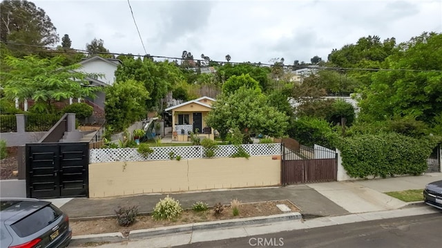 1153 Isabel St, Los Angeles, CA 90065 - obstructed view of property featuring a gate and a fenced front yard