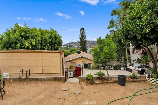 1153 Isabel St, Los Angeles, CA 90065 - view of front facade featuring a mountain view and a patio area