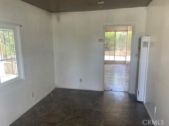 1153 Isabel St, Los Angeles, CA 90065 - empty room with a heating unit and healthy amount of natural light