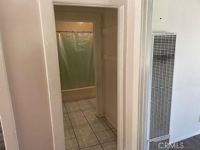 1153 Isabel St, Los Angeles, CA 90065 - full bath with a heating unit, curtained shower, and tile patterned flooring