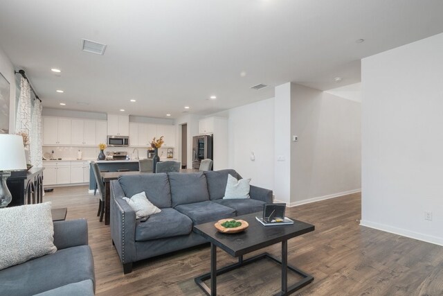 36961 Buccella Ln, Beaumont, CA 92223 - living room featuring wood finished floors, recessed lighting, and wine cooler