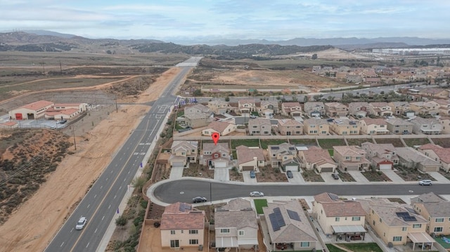 36961 Buccella Ln, Beaumont, CA 92223 - aerial overview of property's location featuring a mountain backdrop and nearby suburban area