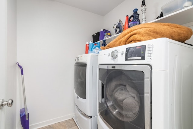 36961 Buccella Ln, Beaumont, CA 92223 - washroom with washer and dryer and baseboards