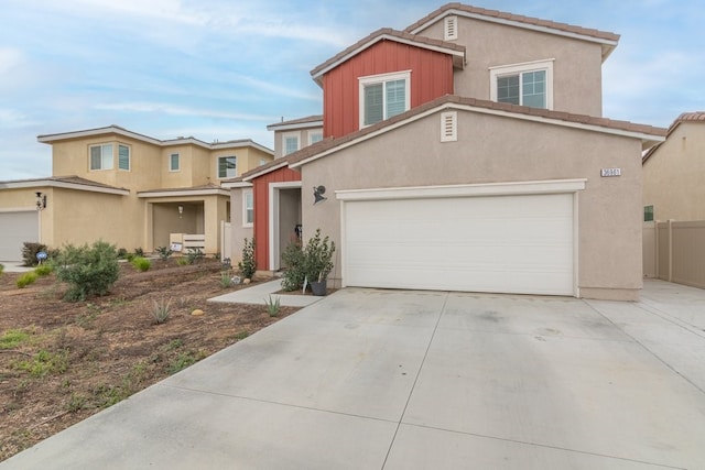 36961 Buccella Ln, Beaumont, CA 92223 - view of front of property featuring concrete driveway, stucco siding, and board and batten siding