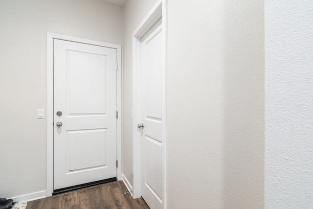 36961 Buccella Ln, Beaumont, CA 92223 - doorway to outside featuring dark wood-style flooring and baseboards