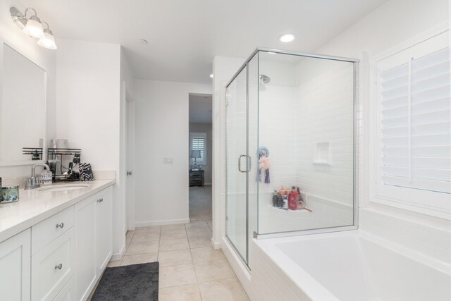 36961 Buccella Ln, Beaumont, CA 92223 - full bath with vanity, a stall shower, a bath, tile patterned floors, and recessed lighting