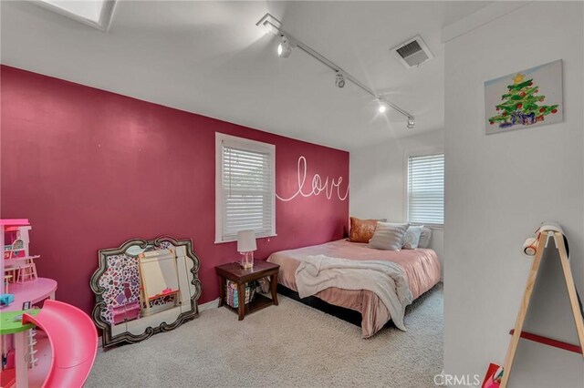 9707 Foothill Blvd, Sylmar, CA 91342 - carpeted bedroom featuring track lighting