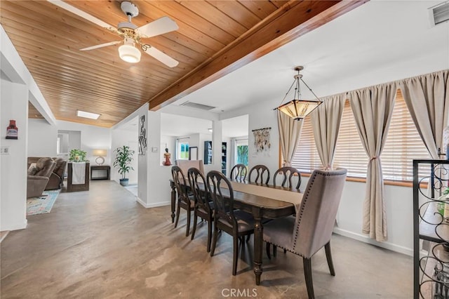 9707 Foothill Blvd, Sylmar, CA 91342 - dining space with concrete floors, ceiling fan, and a wooden ceiling with exposed beams