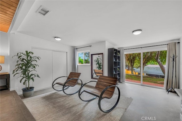 9707 Foothill Blvd, Sylmar, CA 91342 - living area with concrete flooring and baseboards