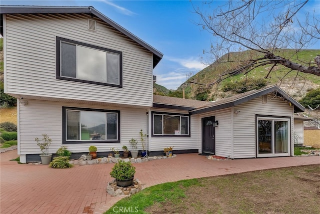 9707 Foothill Blvd, Sylmar, CA 91342 - back of property with a patio area