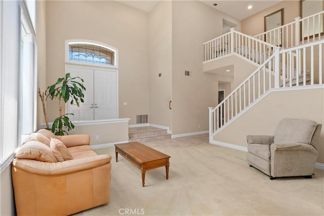 10 Via Berrendo, Rancho Santa Margarita, CA 92688 - carpeted entrance foyer with stairway and a towering ceiling